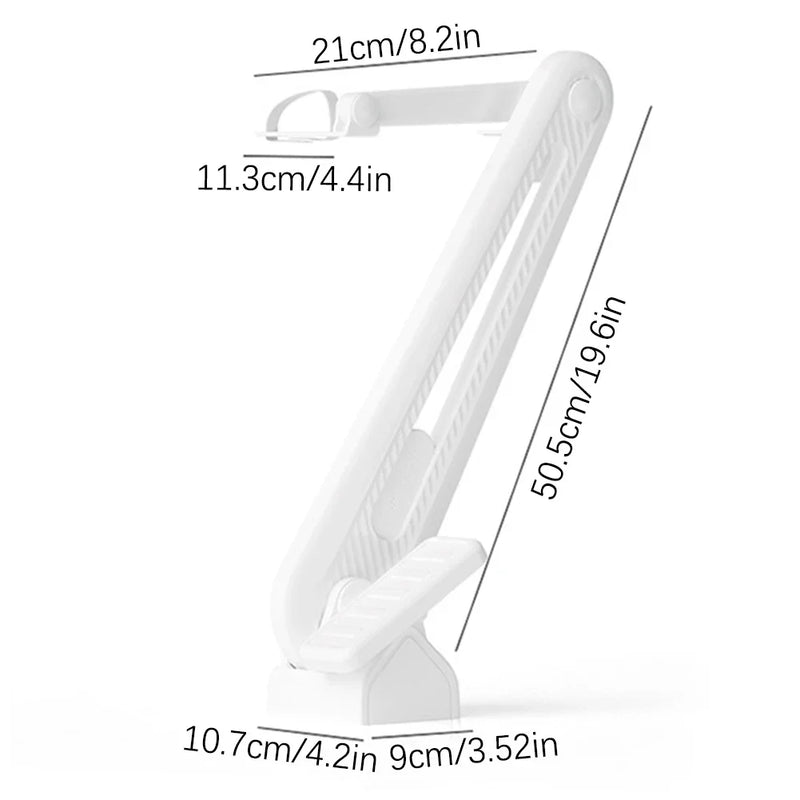 Foot-operated toilet seat lifter